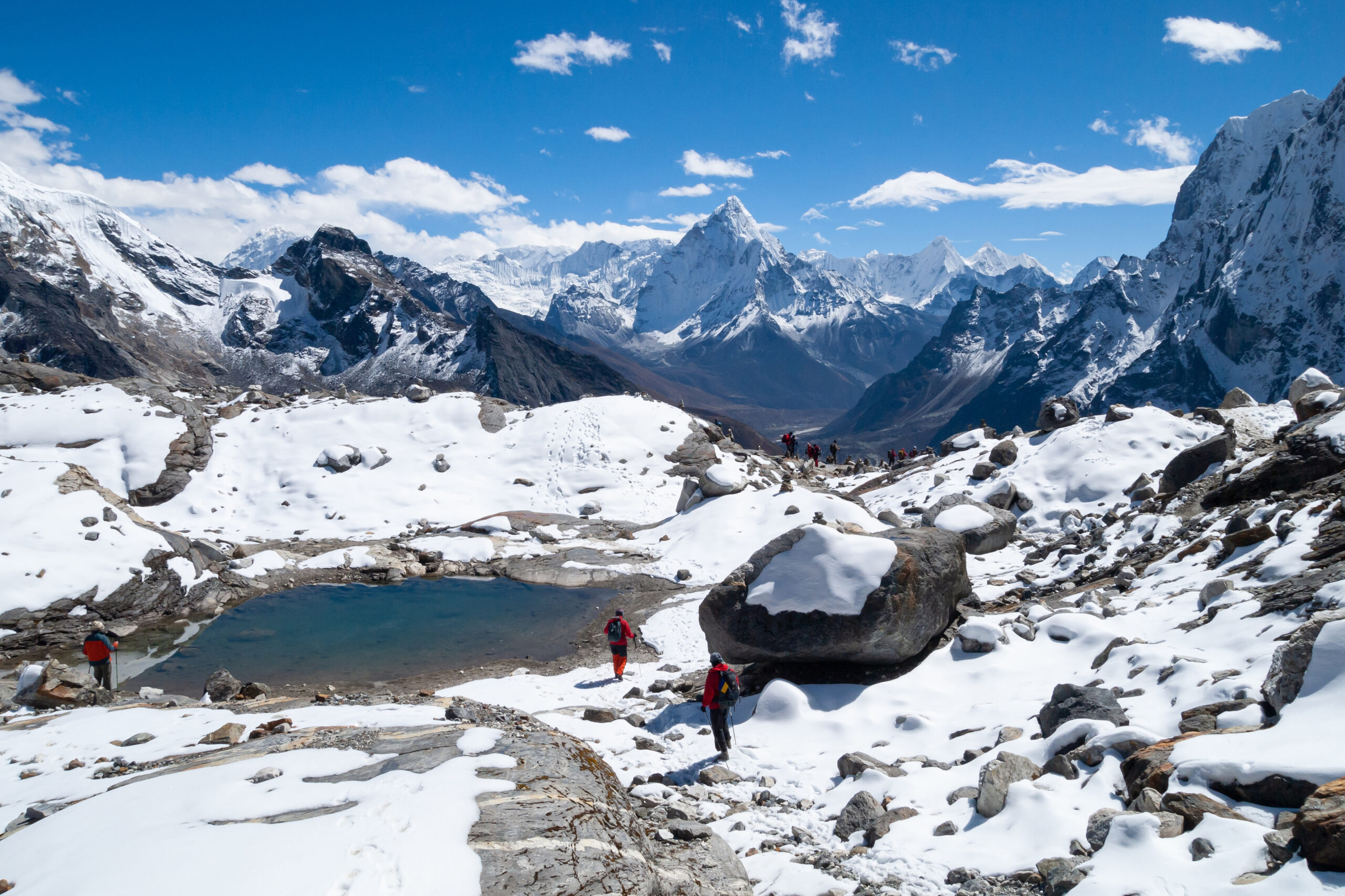 Snow-capped mountains reflected in a still lake